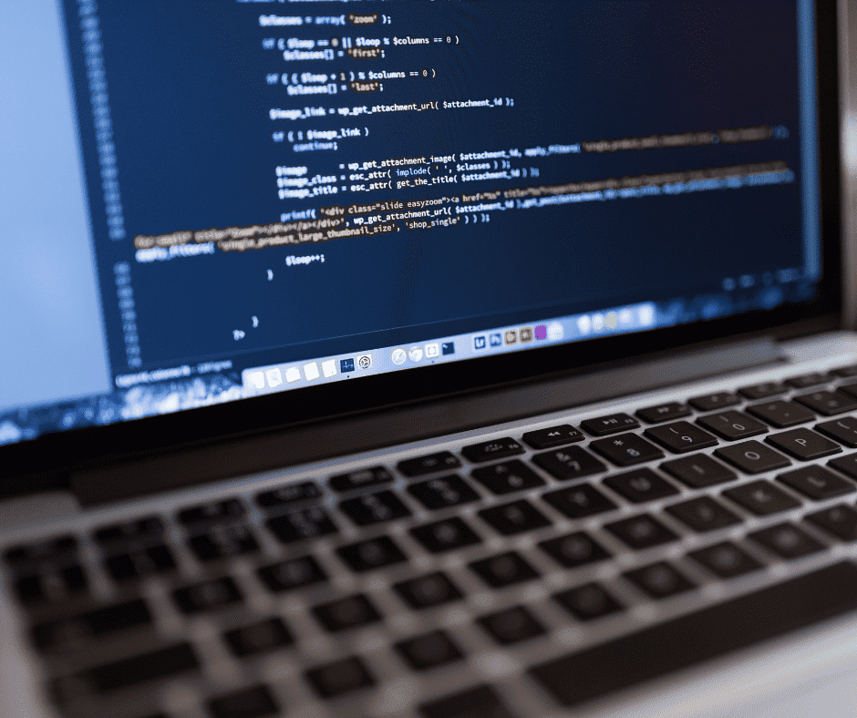 Laptop showing computer code