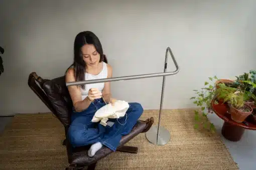 Person sewing with Daylight Slimline 4 Floor Lamp