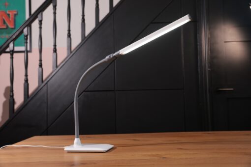 Daylight UnoPro Table Lamp with staircase in background